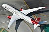 Ett Virgin Atlantic-flygplan ses ovanifrån på en flygplats med markerade taxibanor.